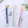 Colourful alpaca design printed on a silver 30 cm aluminium ruler with measurement markings