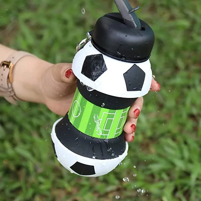 White football silicone collapsible water bottle with straw, 18oz BPA-free, leak-proof spout and carrying clip