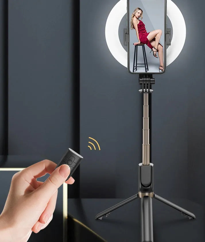 XYXD MJ07PRO black fill light with neon colours and phone clamp on desktop