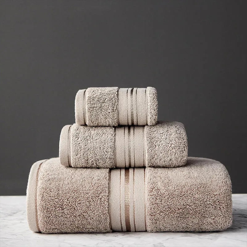 Pure cotton bath towel set showing three pieces in blue colour with floral pattern detail