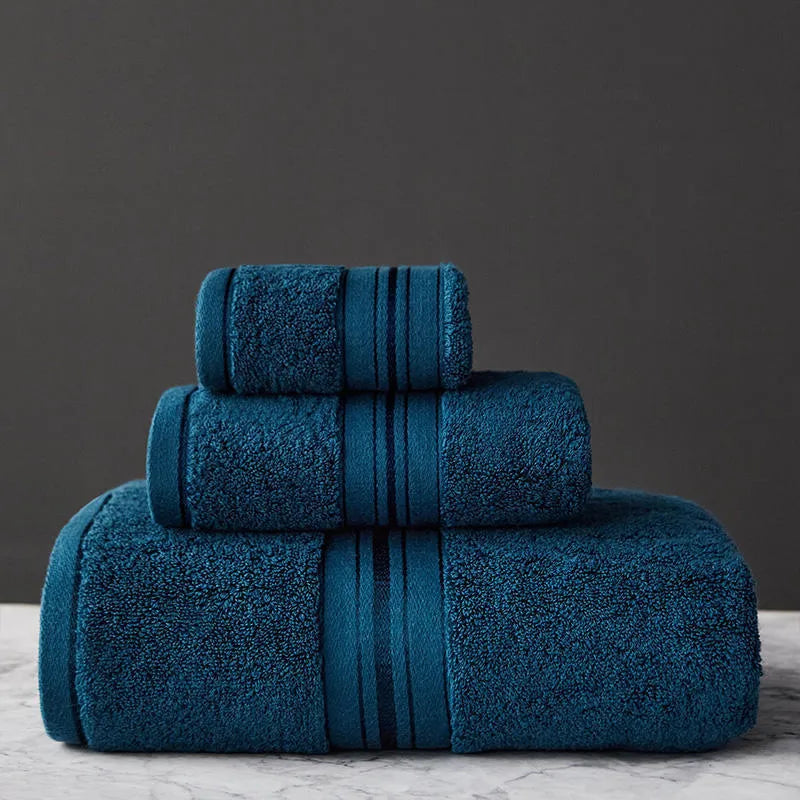 Pure cotton bath towel set showing three pieces in blue colour with floral pattern detail
