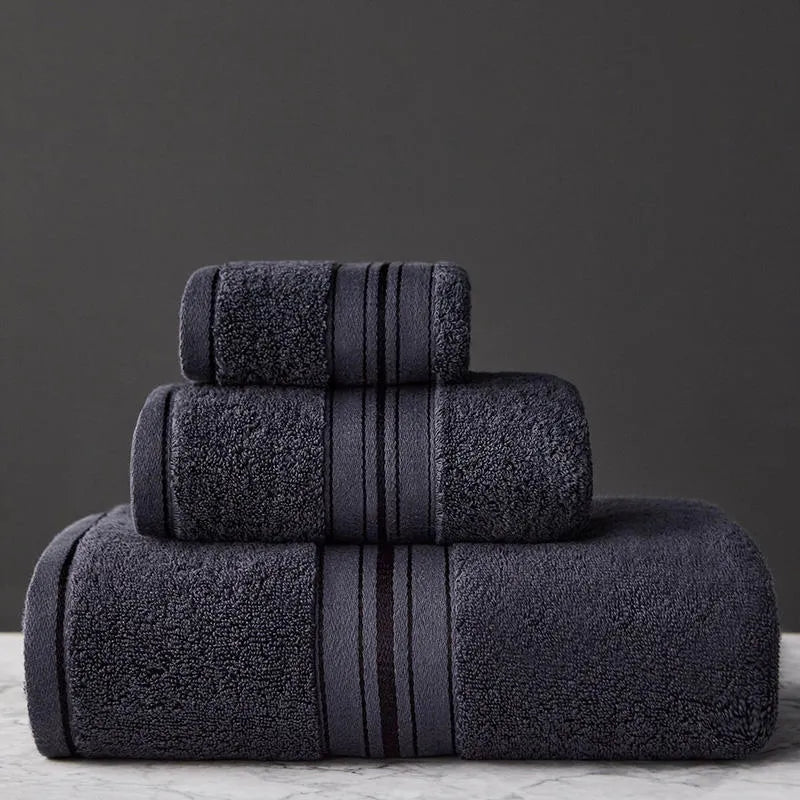 Pure cotton bath towel set showing three pieces in blue colour with floral pattern detail