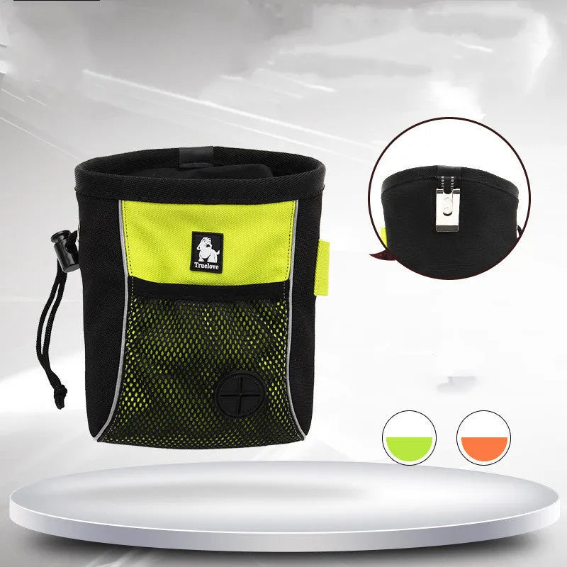 Green dog training waist bag with removable waste pouch, shown on a person's hip.