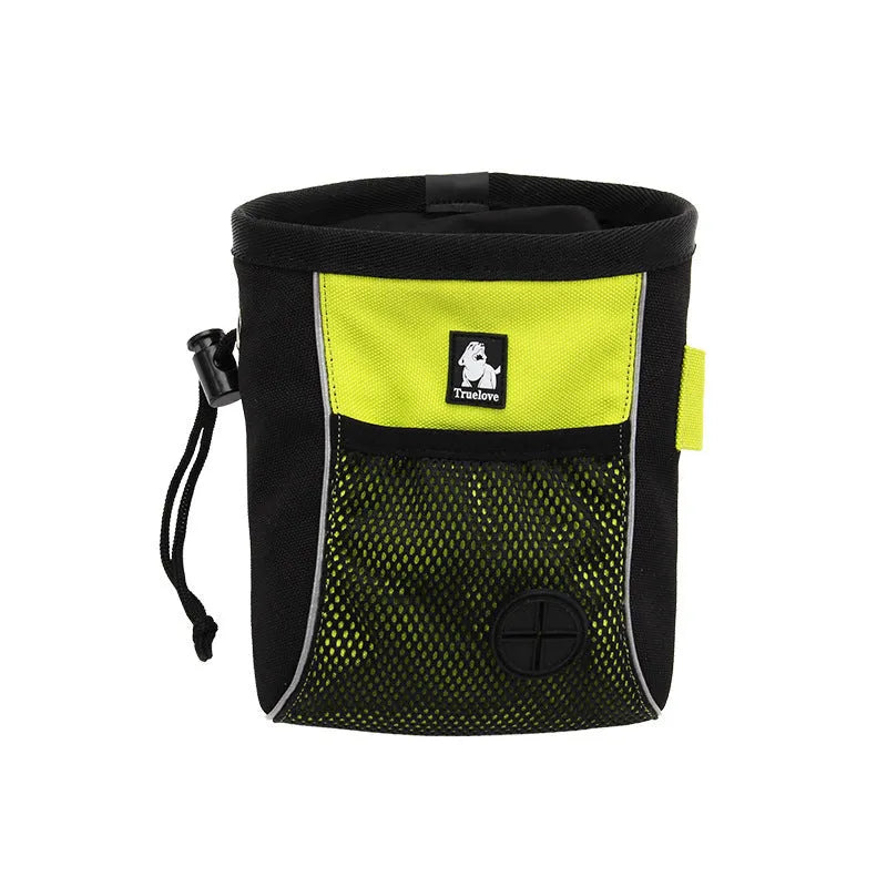 Green dog training waist bag with removable waste pouch, shown on a person's hip.