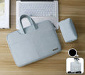 Blue universal laptop sleeve with zip open, showing internal shock-resistant liner, computer pocket, and smaller organiser pockets.