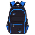 Green waterproof nylon school backpack for students with side pockets and mesh compartment.