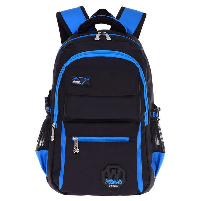 Green waterproof nylon school backpack for students with side pockets and mesh compartment.