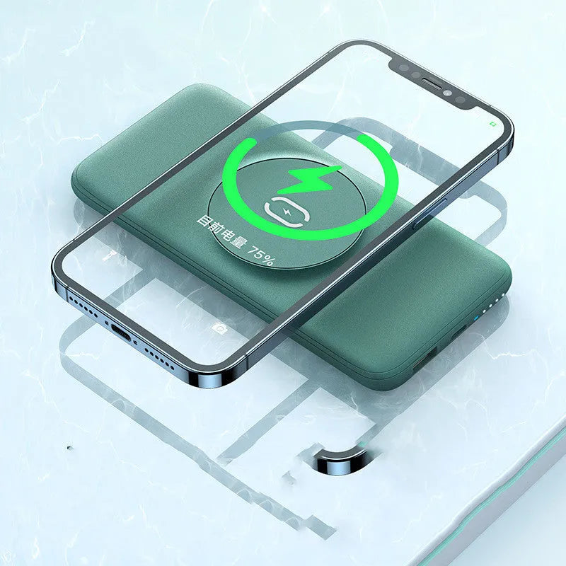 Maiduo mint green Magsafe power bank magnetically attached to an iPhone, showing its slim clip-on design.