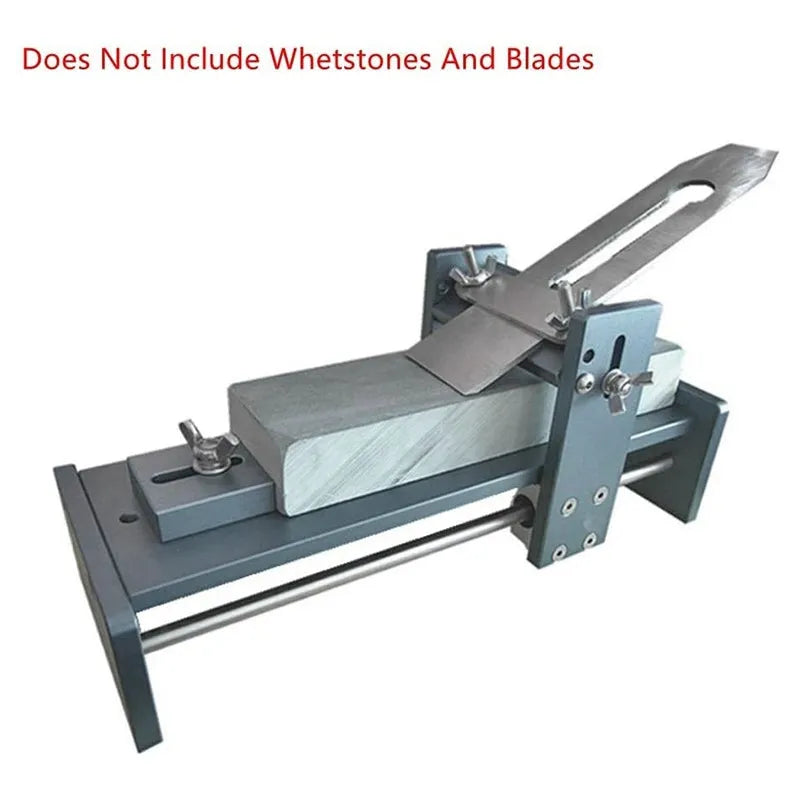 Aluminium fixed angle sharpening tool for woodworking chisels and planer blades on a workbench.