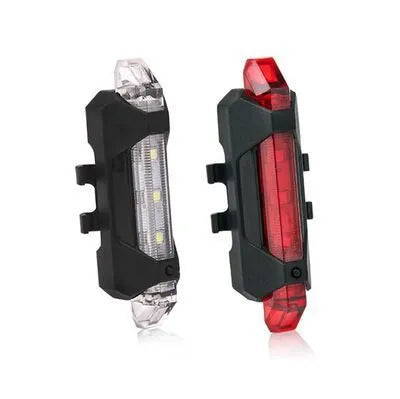 USB rechargeable red bicycle tail light with rubber buckle strap on a bike seat post