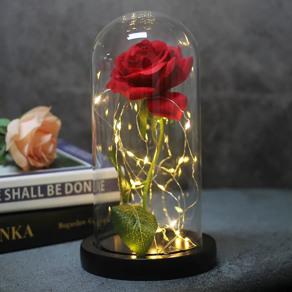 LED illuminated simulation rose bouquet in a gift box with glass lampshade and solid wood base.