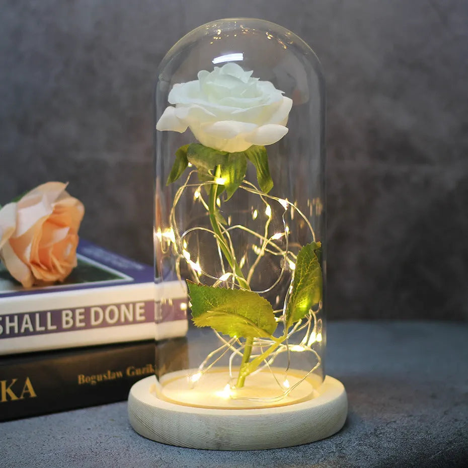 LED illuminated simulation rose bouquet in a gift box with glass lampshade and solid wood base.