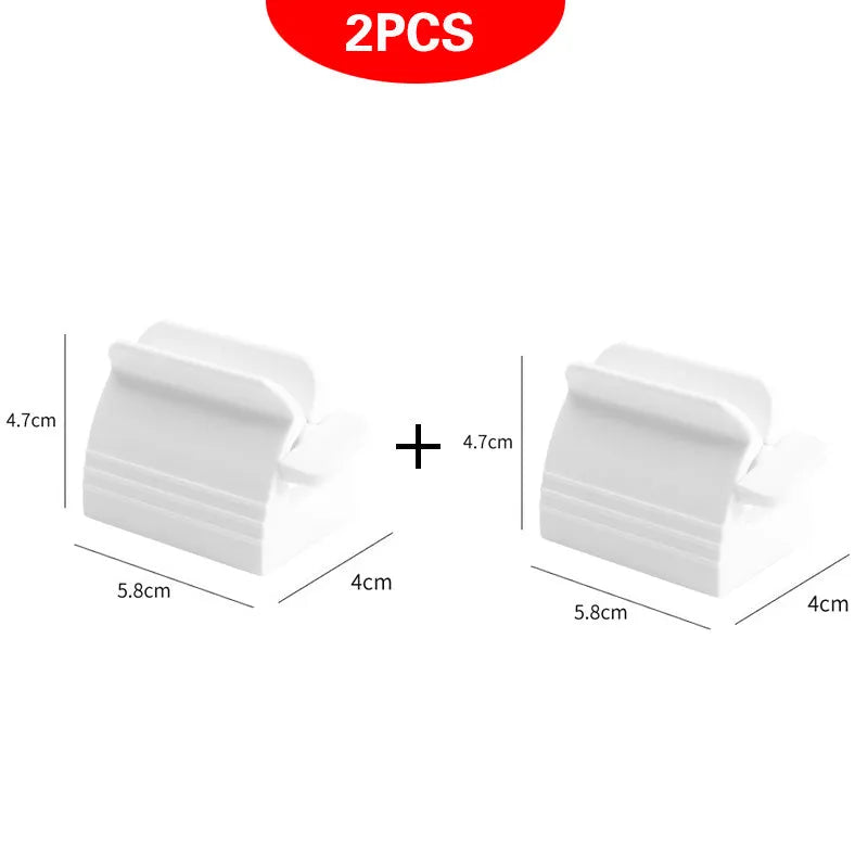 Large toothpaste squeezer in plastic and ABS for bathroom use, shown in white and red