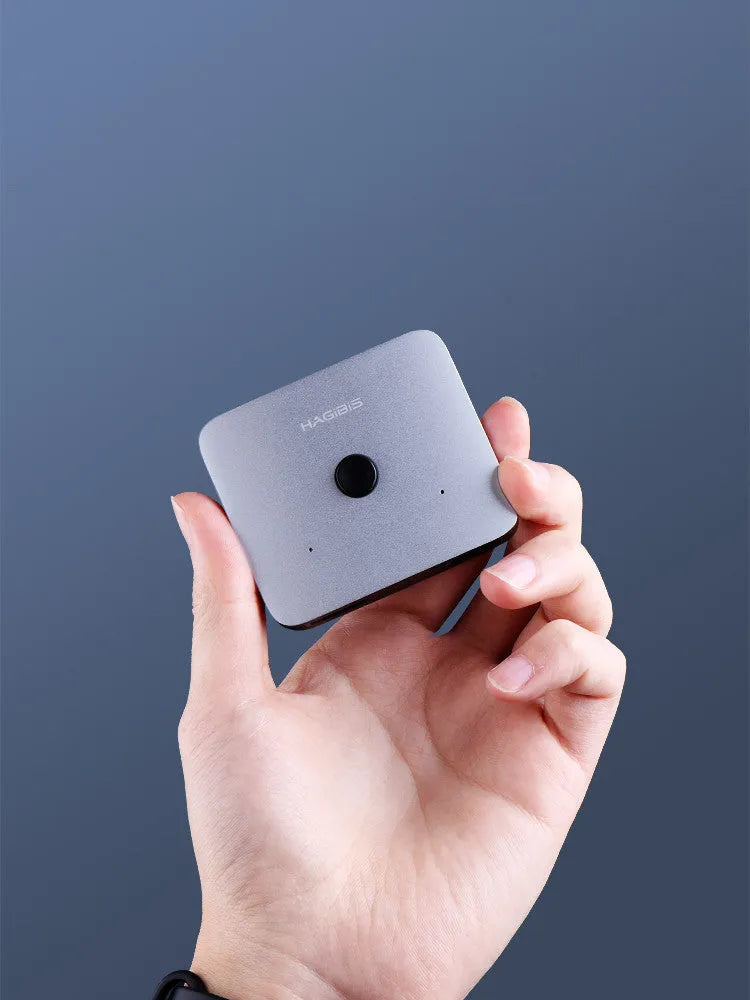 Grey Haibeisi HDMI switcher unit with two input ports and one output port for connecting computers and media devices to a TV or monitor.