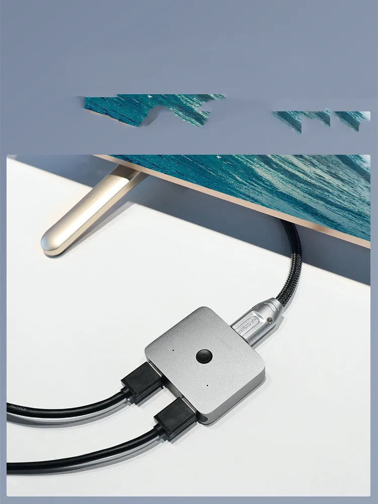 Grey Haibeisi HDMI switcher unit with two input ports and one output port for connecting computers and media devices to a TV or monitor.