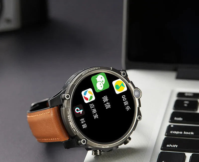 Black smart phone watch with 1.6-inch screen on a wrist strap, showing dual cameras and a heart rate sensor.