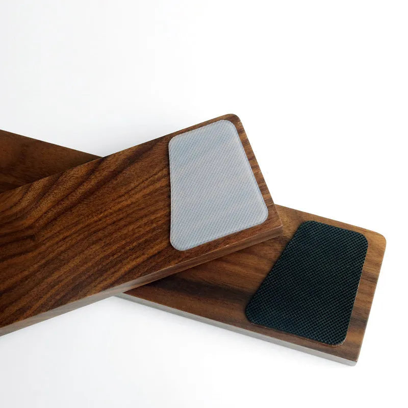 Walnut wood mechanical keyboard wrist rest showing natural wood grain and ergonomic design