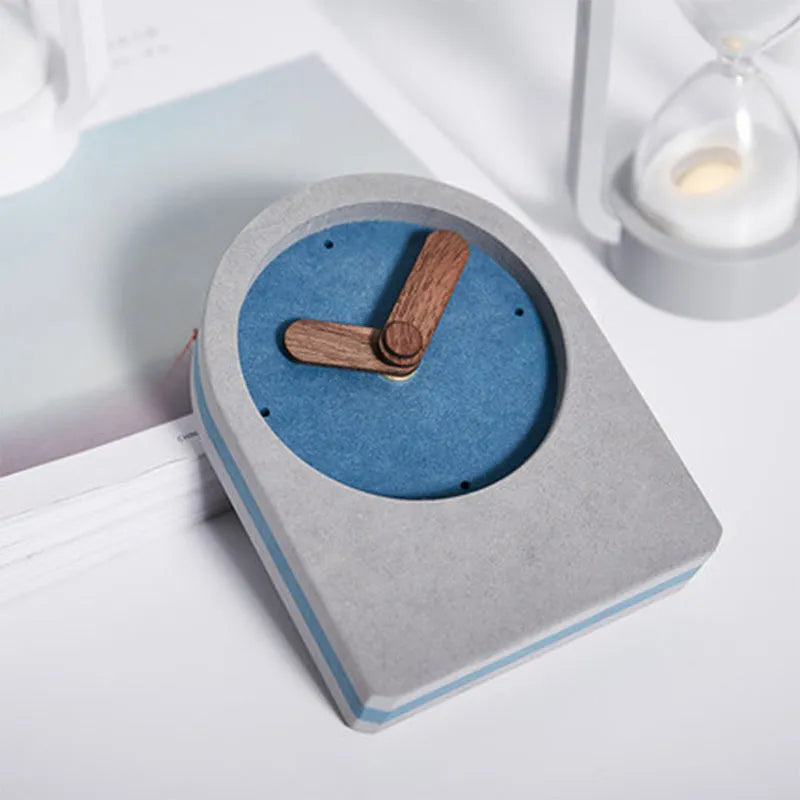 Gray Nordic silent desktop clock with MDF body and walnut trim on a desk surface