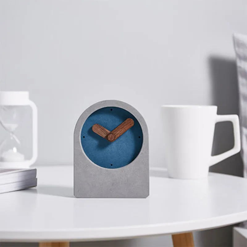 Gray Nordic silent desktop clock with MDF body and walnut trim on a desk surface