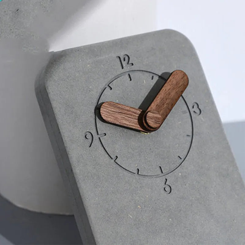 Gray Nordic silent desktop clock with MDF body and walnut trim on a desk surface