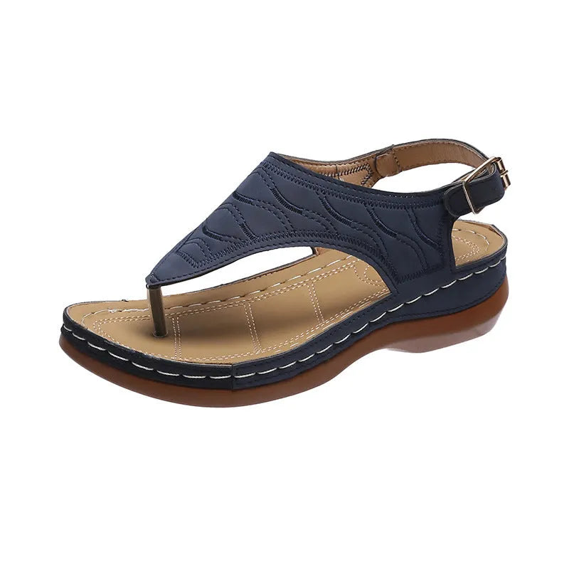 Women's wedge heel casual sandals in red with an adjustable back strap and flip-flop style.