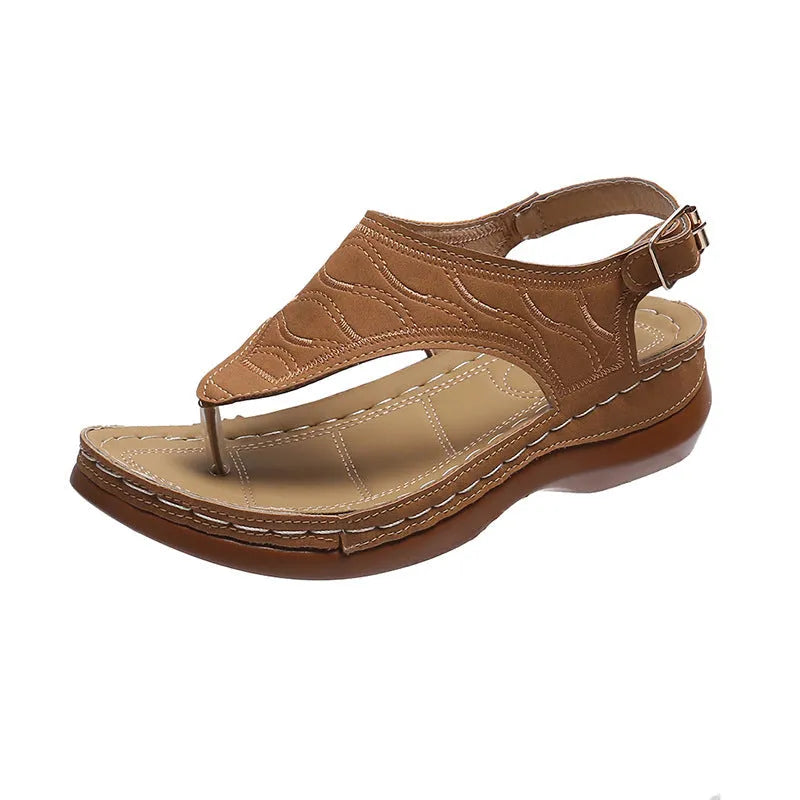 Women's wedge heel casual sandals in red with an adjustable back strap and flip-flop style.