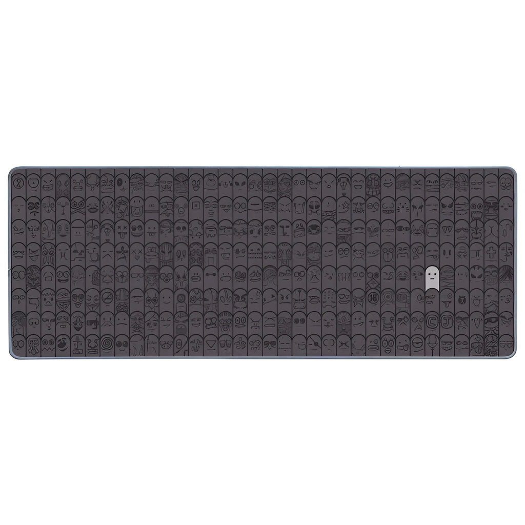 Grey cloth computer mouse wrist rest pad shown on a desk next to a gaming mouse.
