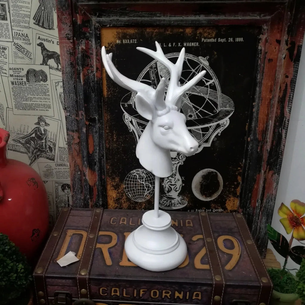 Solid natural resin animal decoration centrepiece in black, white, or wood colour, dimensions 13 by 15 by 32 centimetres.