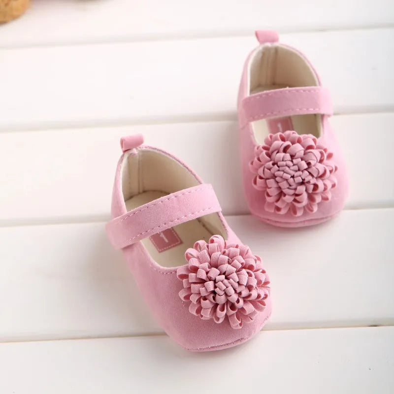 Soft sole toddler shoes with cotton upper and flower detail in yellow, red, pink or apricot, sizes 11cm to 13cm