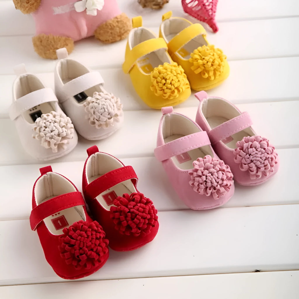 Soft sole toddler shoes with cotton upper and flower detail in yellow, red, pink or apricot, sizes 11cm to 13cm