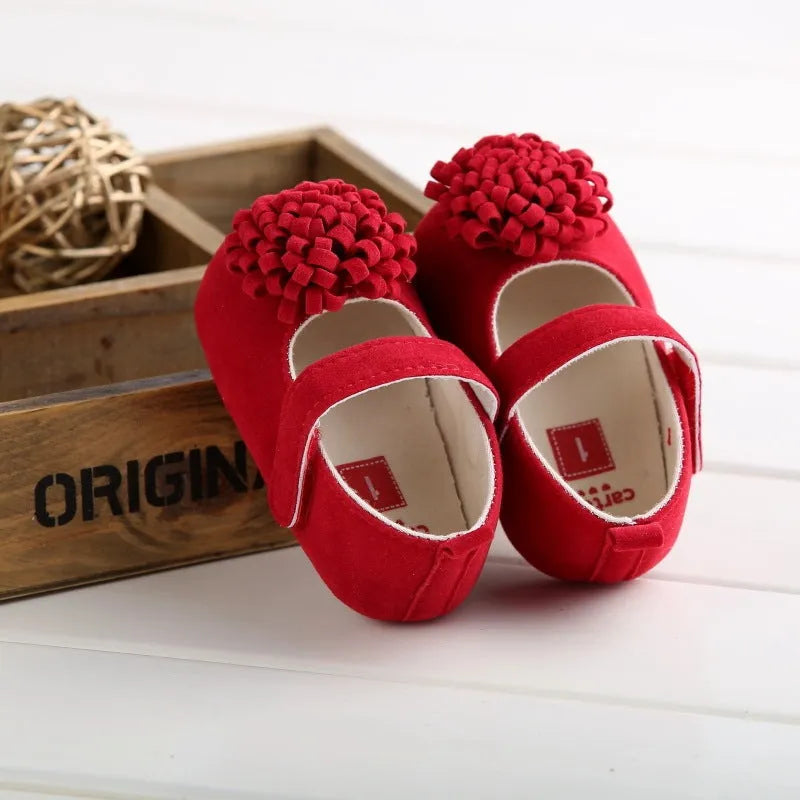 Soft sole toddler shoes with cotton upper and flower detail in yellow, red, pink or apricot, sizes 11cm to 13cm