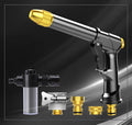 Aluminium alloy telescopic garden hose with water gun extended on a patio.