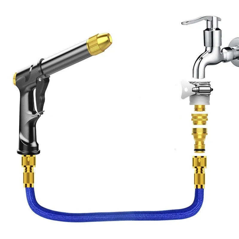 Aluminium alloy telescopic garden hose with water gun extended on a patio.