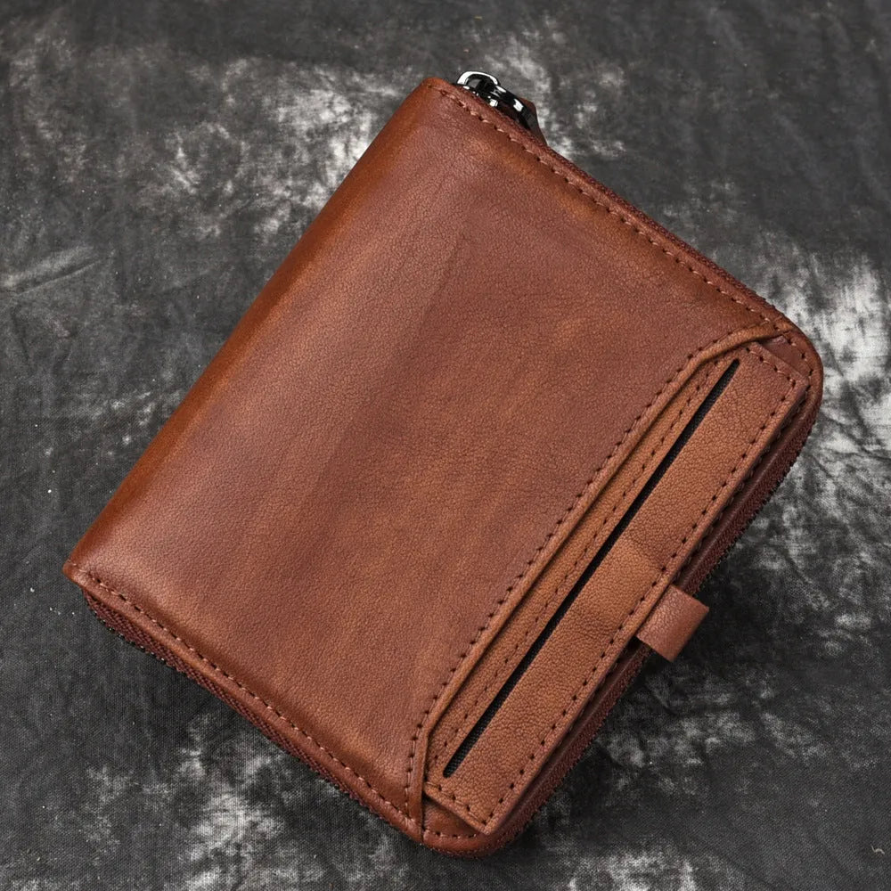 Men's brown cow leather vertical zipper wallet with compact 11cm size, retro style, and metal zipper closure