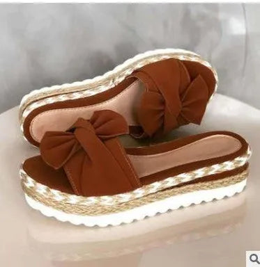 Platform wedge heel ladies bow sandals in cloth upper and imitation leather lining, shown in multiple colours.
