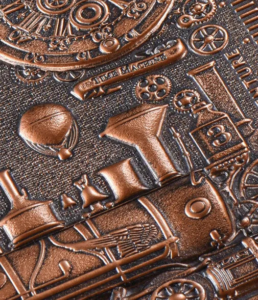 European relief embossed design on a metallic leather notepad cover, shown in green bronze, with dimensions 21.5 by 14.5 cm.