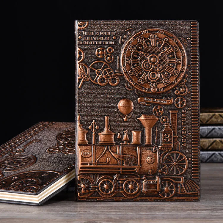 European relief embossed design on a metallic leather notepad cover, shown in green bronze, with dimensions 21.5 by 14.5 cm.