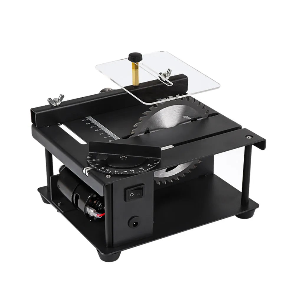 Black miniature precision table saw with sliding table and 110mm saw blade on a workbench