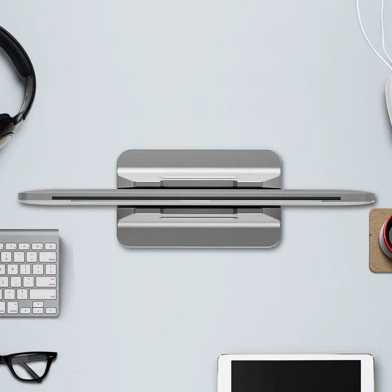 Silver aluminium alloy vertical notebook storage bracket measuring 16.5cm x 10cm x 6cm for 15-30mm laptops