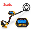 GC1028 black and yellow professional metal detector with LCD screen and adjustable pole on grass.
