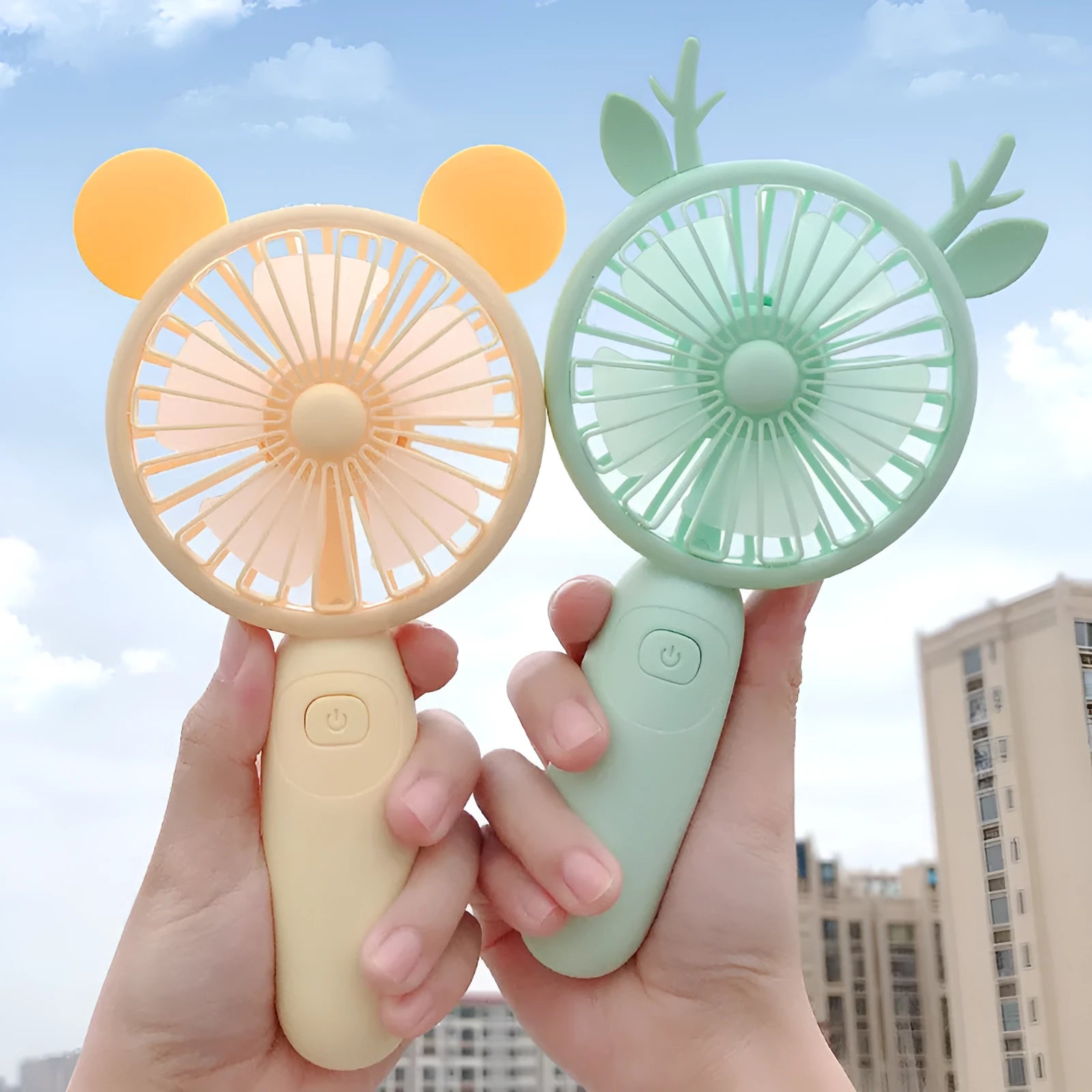 A handheld mini fan with plastic blades, shown in blue, green, pink, and yellow colour options.