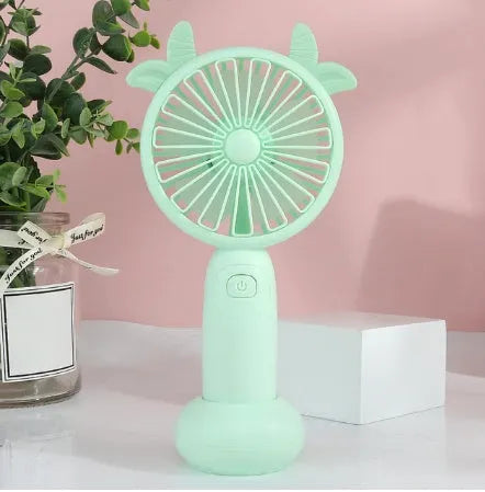 A handheld mini fan with plastic blades, shown in blue, green, pink, and yellow colour options.