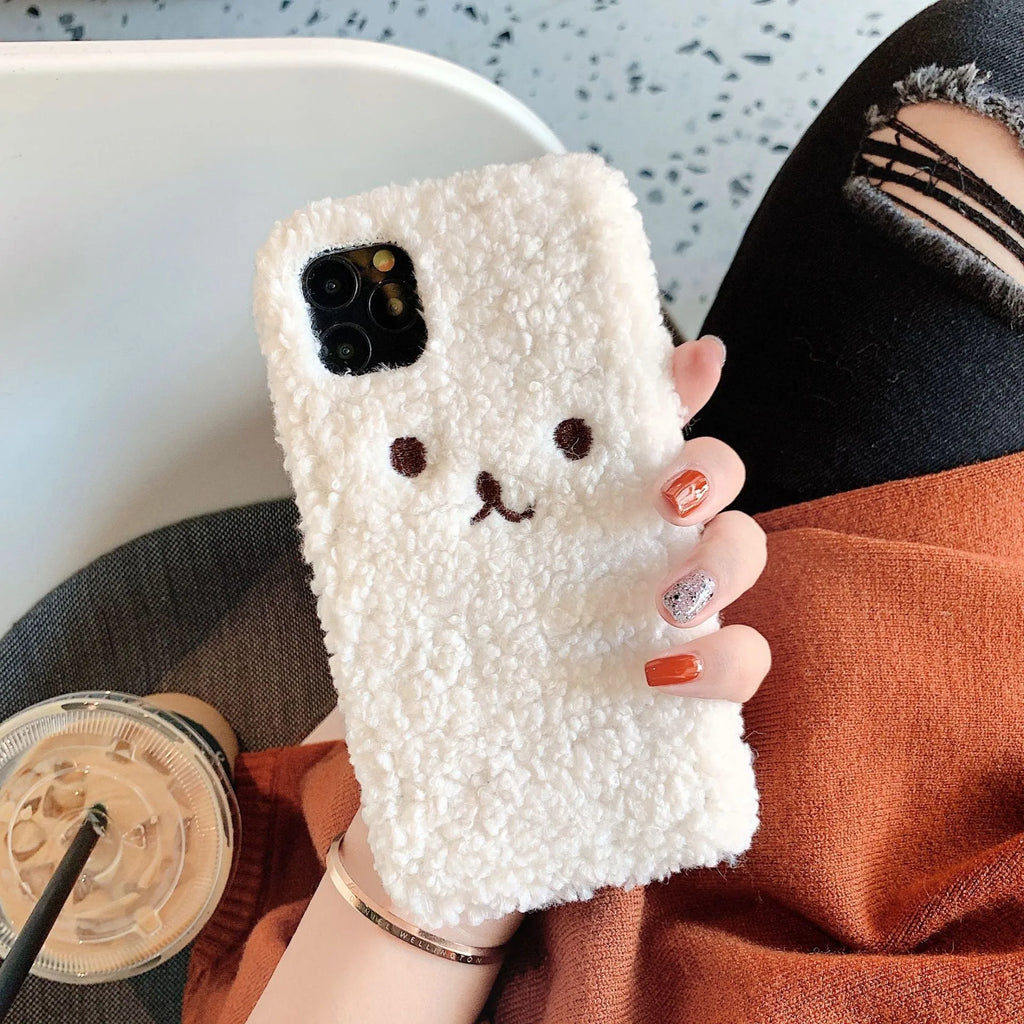 Brown embroidered plush bear face on a clear TPU iPhone case for iPhone 11