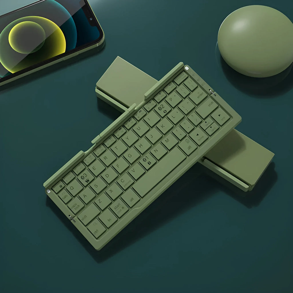 Silver white folding Bluetooth keyboard with stand holding smartphone