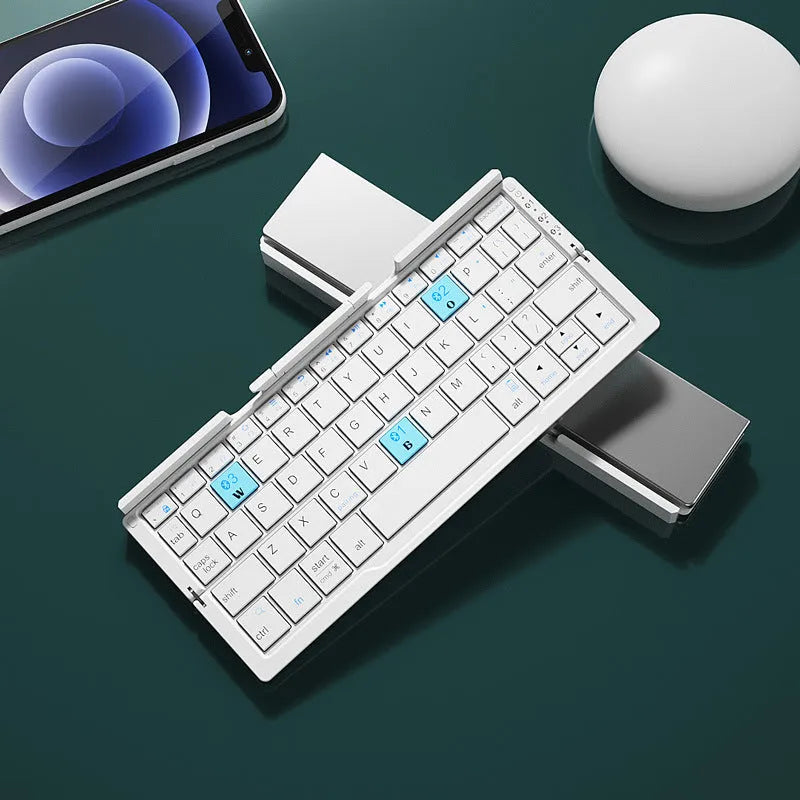 Silver white folding Bluetooth keyboard with stand holding smartphone