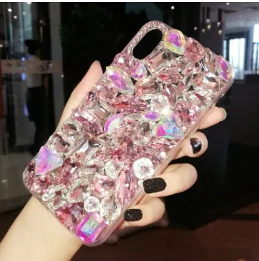 Clear iPhone case with crystal rhinestone decoration on the back, shown in green colour.