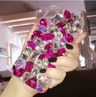 Clear iPhone case with crystal rhinestone decoration on the back, shown in green colour.