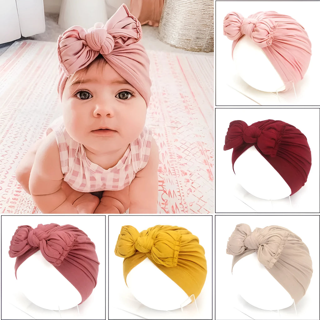 Soft acrylic knitted turban-style baby hat for newborn to 28-month infants in solid candy colours