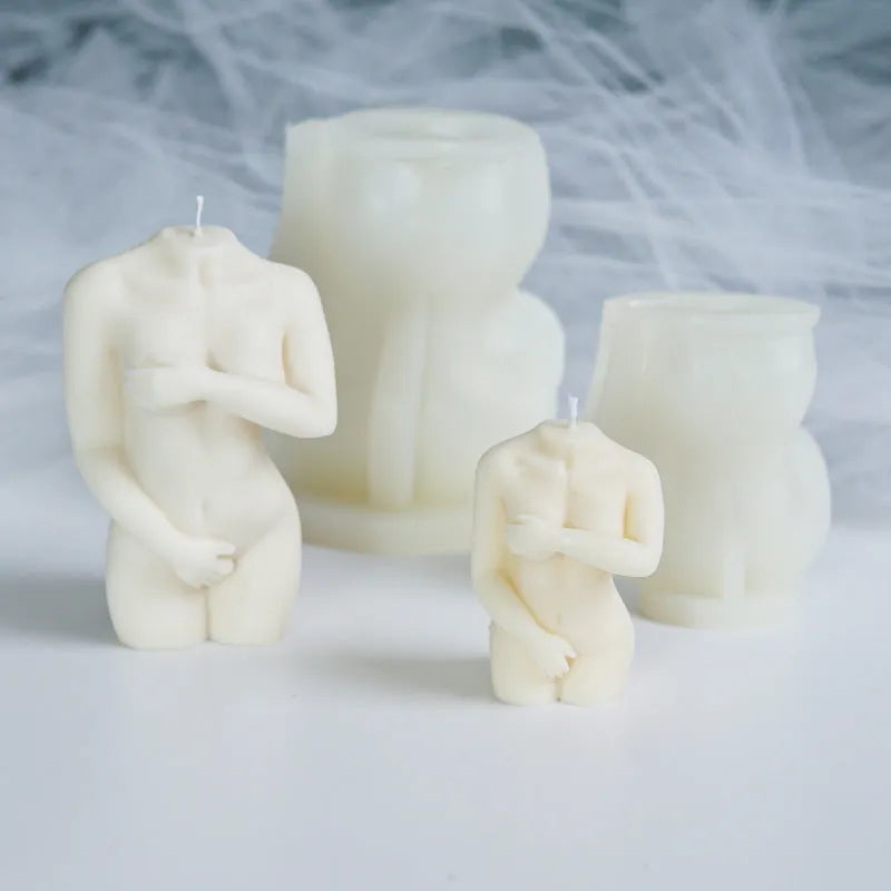 Silicone mould showing detailed shy female body shape for making candles or cakes.