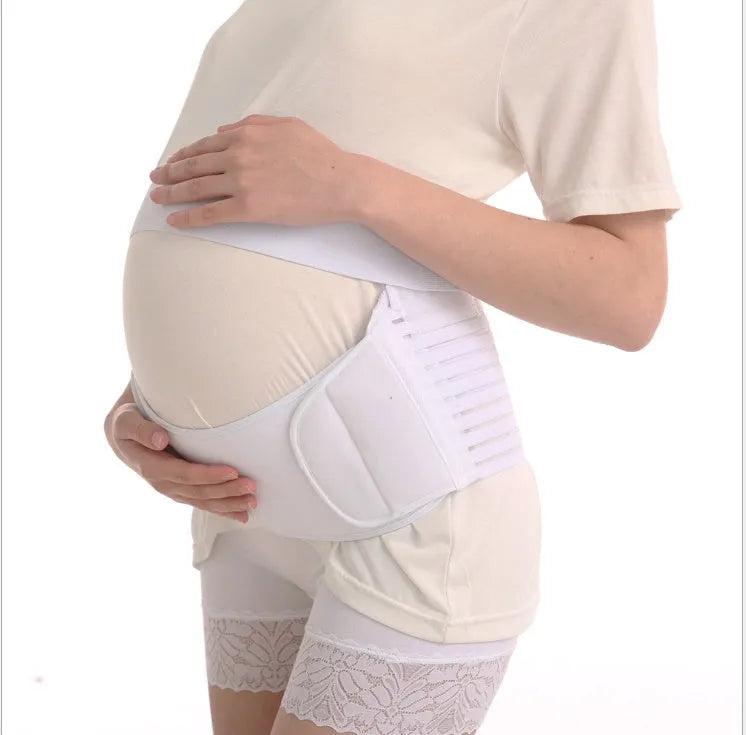 Adjustable pregnancy support belt with Velcro closure in various colours wrapped around abdominal area